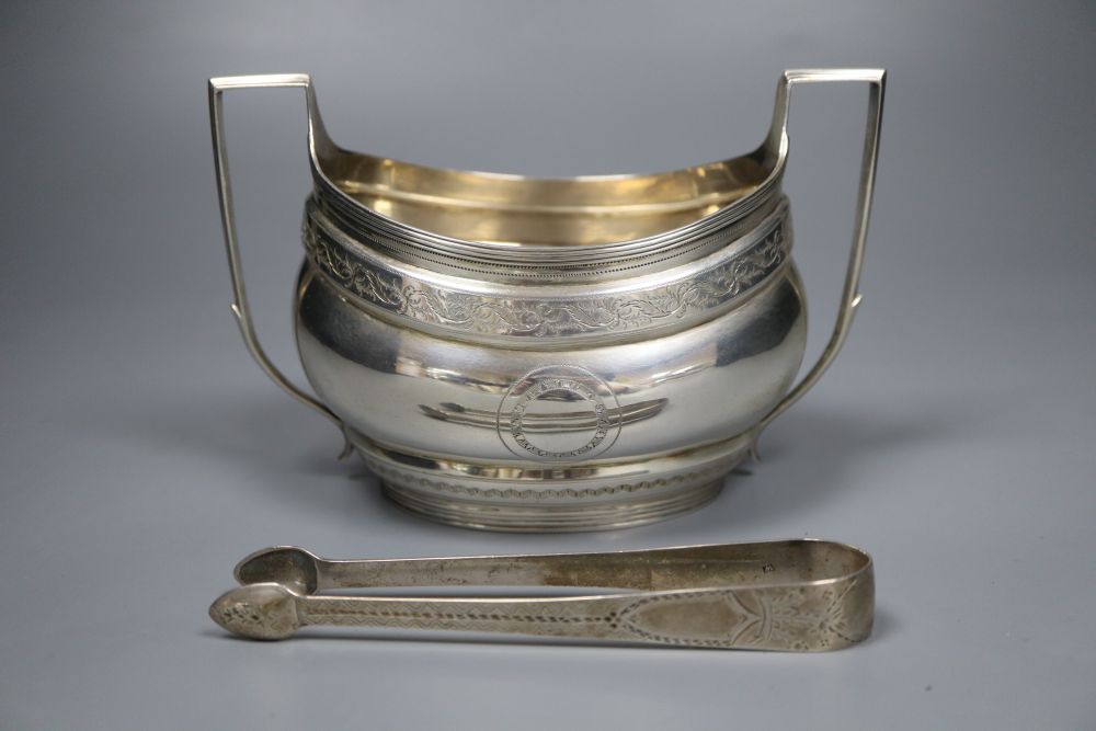 A George III silver sugar bowl, London, 1801 and pair of Georgian silver sugar tongs, 9.5oz.